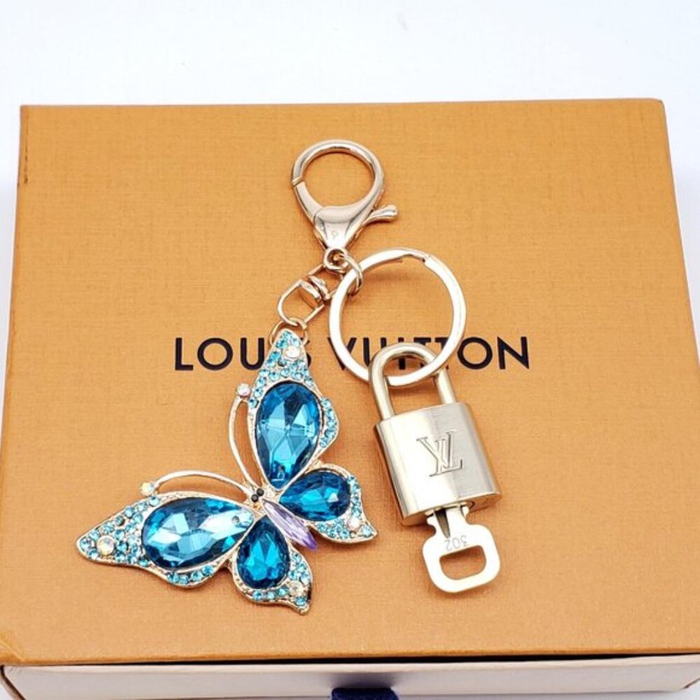 Authentic Louis Vuitton Gold Lock & Box w/ Unbranded Butterfly Bagcharm 120825